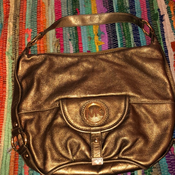 Michael Kors Handbags - Michael Kors Bronze Leather Purse WORN ONCE.